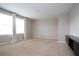 Bright bedroom features neutral walls, carpet, and windows dressed with white curtains at 13106 Zolo Springs Cir, Riverview, FL 33579