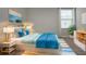 Cozy bedroom with a large window, stylish décor, and comfortable furnishings at 13106 Zolo Springs Cir, Riverview, FL 33579