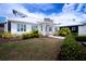 Exterior of fitness center with garden and landscaped walkway at 13106 Zolo Springs Cir, Riverview, FL 33579