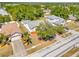 Aerial view of single-Gathering home with well-maintained landscaping and surrounding mature trees at 13216 Parkhurst Ct, Riverview, FL 33569