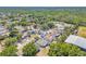 An aerial view of the neighborhood featuring mature trees and lush landscaping at 13216 Parkhurst Ct, Riverview, FL 33569