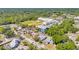 Overhead shot showcasing a charming neighborhood near a local school and baseball field at 13216 Parkhurst Ct, Riverview, FL 33569