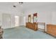 Spacious bedroom with a ceiling fan and an ensuite bathroom at 13216 Parkhurst Ct, Riverview, FL 33569