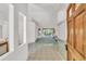Bright and airy foyer with tile flooring and an open view into the living spaces at 13216 Parkhurst Ct, Riverview, FL 33569