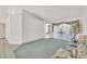 Spacious living room with neutral walls, and sliding glass doors leading to the outside at 13216 Parkhurst Ct, Riverview, FL 33569