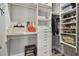 A walk-in closet with custom storage solutions provides ample space for clothes, shoes and accessories at 18 Franklin S Ct # D, St Petersburg, FL 33711