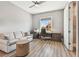 Bright office featuring a built-in desk and an ensuite bathroom with a glass-enclosed shower at 18 Franklin S Ct # D, St Petersburg, FL 33711