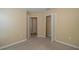 Neutral bedroom featuring a closet and view to a second room at 5913 Lawrin Ct, Wesley Chapel, FL 33544