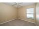 Spare bedroom with carpet, ceiling fan, and natural light at 5913 Lawrin Ct, Wesley Chapel, FL 33544