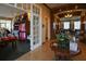 Interior view of a pro shop and dining area featuring golf merchandise and comfortable seating at 5913 Lawrin Ct, Wesley Chapel, FL 33544