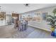 Sunlit dining room featuring a large window with neighborhood views and modern decor at 809 59Th Ave, St Pete Beach, FL 33706