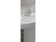 Close-up of a pedestal sink with chrome faucet in a neutral-toned bathroom at 9716 Mulberry Marsh Ln, Sun City Center, FL 33573