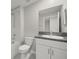 Bathroom with granite countertop, sink, tub, and shower at 9716 Mulberry Marsh Ln, Sun City Center, FL 33573