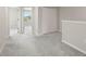 Carpeted bedroom with closet and a doorway at 9716 Mulberry Marsh Ln, Sun City Center, FL 33573