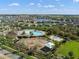 Aerial community view highlighting the community pool, playground, and lush landscaping at 11717 Navajo Sandstone St, Riverview, FL 33579