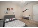 Bedroom featuring carpet floors, dresser, and a comfy bed at 11717 Navajo Sandstone St, Riverview, FL 33579