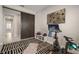 Home gym features sliding barn door and patterned accent rug at 11717 Navajo Sandstone St, Riverview, FL 33579