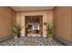 Welcoming lobby entrance featuring lush plants and views into lounge area at 15000 Madeira Way # 609, Madeira Beach, FL 33708