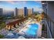 Luxurious outdoor pool area with comfortable lounge chairs and ocean views at 15000 Madeira Way # 645, Madeira Beach, FL 33708