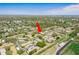 Aerial view showcasing the community's prime location near recreation and sports facilities at 1701 Pinehurst Rd # 27D, Dunedin, FL 34698