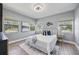 Bright bedroom with natural light, hardwood flooring, and modern decor at 2301 46Th S St, St Petersburg, FL 33711