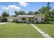 Charming single-story home with a well-manicured lawn and inviting curb appeal at 2301 46Th S St, St Petersburg, FL 33711