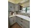 Charming kitchen with modern cabinetry, quartz countertops and stainless steel appliances at 2301 46Th S St, St Petersburg, FL 33711