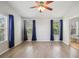 Bright bedroom features stylish flooring, neutral paint and natural light at 2967 Bayshore Pointe Dr, Tampa, FL 33611