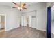 Spacious bedroom with stylish flooring, neutral paint and a ceiling fan at 2967 Bayshore Pointe Dr, Tampa, FL 33611