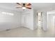 Bedroom with neutral colors and a ceiling fan with decorative lighting and a large closet for storage at 3943 Fontainebleau Dr, Tampa, FL 33634