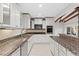 Modern kitchen design with granite countertops, stainless steel appliances, and ample cabinet space at 3943 Fontainebleau Dr, Tampa, FL 33634
