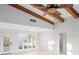 Open living area with a large window, allowing natural light to flood in. The room is painted in neutral colors at 3943 Fontainebleau Dr, Tampa, FL 33634