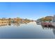 Scenic waterfront view showcasing calm water and a residential neighborhood at 3943 Fontainebleau Dr, Tampa, FL 33634