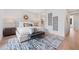Bright bedroom with a decorative rug, stylish wall art, and a serene color palette at 532 W Plaza Pl # 2, Tampa, FL 33602
