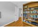 Bright room with hardwood floors with a bookcase at 6250 11Th S Ave, Gulfport, FL 33707