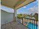 Balcony with a view of the pool and waterfront neighborhood at 912 Symphony Beach Ln, Apollo Beach, FL 33572
