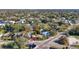 Aerial view of cozy single Gathering home nestled among mature trees, offering privacy and shade at 1011 W Columbus Dr, Tampa, FL 33602