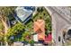 Aerial view of house with a backyard and an outdoor patio near a red driveway at 1011 W Columbus Dr, Tampa, FL 33602