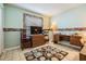 Bedroom with unique border, wood furniture, and a desk with a chair at 11018 Courtland St, Trinity, FL 34655