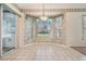 Bright dining area with a bay window overlooking the backyard at 11018 Courtland St, Trinity, FL 34655