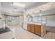 Bright kitchen with breakfast bar overlooking the living area at 11018 Courtland St, Trinity, FL 34655