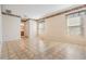 Bright living room with tile flooring and doorway leading to another room at 11018 Courtland St, Trinity, FL 34655
