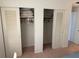 Bedroom with two storage closets with sliding doors for storage at 14132 89Th Ave, Seminole, FL 33776