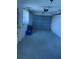 Single car garage with shelving and lots of storage space for vehicles and equipment at 14132 89Th Ave, Seminole, FL 33776