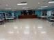 Spacious hall perfect for events, with a convenient kitchen area and ample table seating at 14132 89Th Ave, Seminole, FL 33776