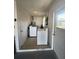 Laundry room with a washer and dryer and a water heater at 14132 89Th Ave, Seminole, FL 33776
