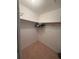 Carpeted walk-in closet with upper shelf and clothing rod at 14132 89Th Ave, Seminole, FL 33776