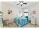 Bright bedroom featuring cheerful decor, comfortable bedding, and a cozy atmosphere at 1721 Loriana St, Brandon, FL 33511