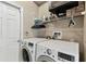 Functional laundry room with modern washer and dryer at 1721 Loriana St, Brandon, FL 33511