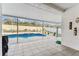 Private screened-in pool area perfect for relaxation, featuring a well-manicured yard at 1721 Loriana St, Brandon, FL 33511